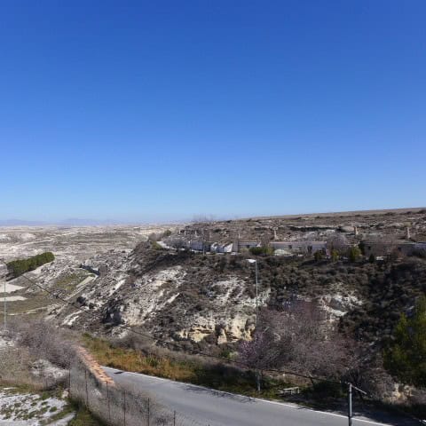Unique cave house in Orce, Granada with scenic landscape views.
