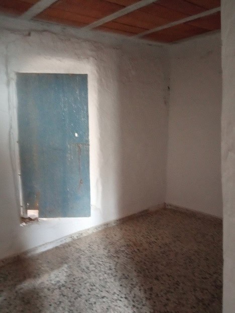 Village Property in Gor, Granada with rustic interior and traditional architecture.