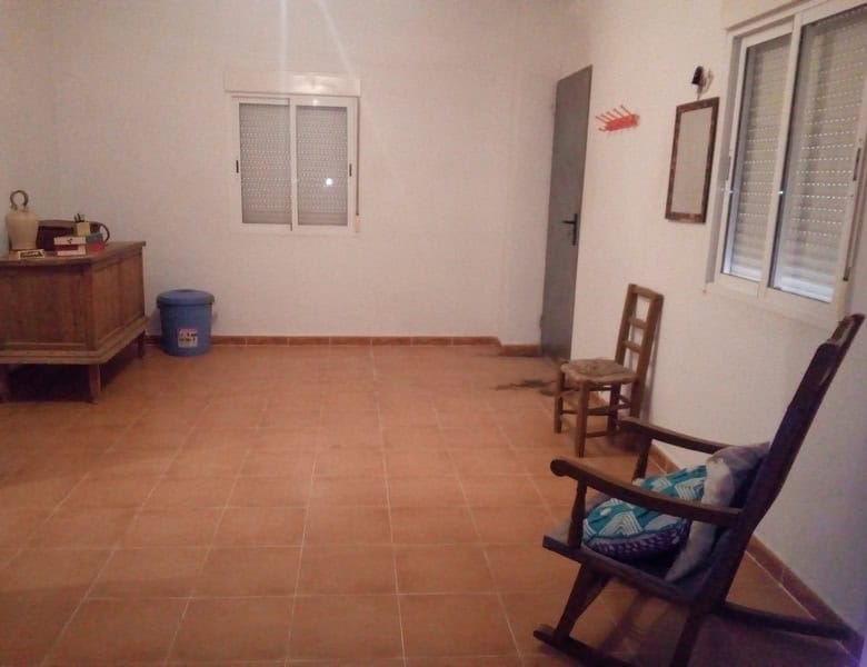 Charming interior of a village property in Urracal, Almeria, featuring simple furnishings and a cozy.