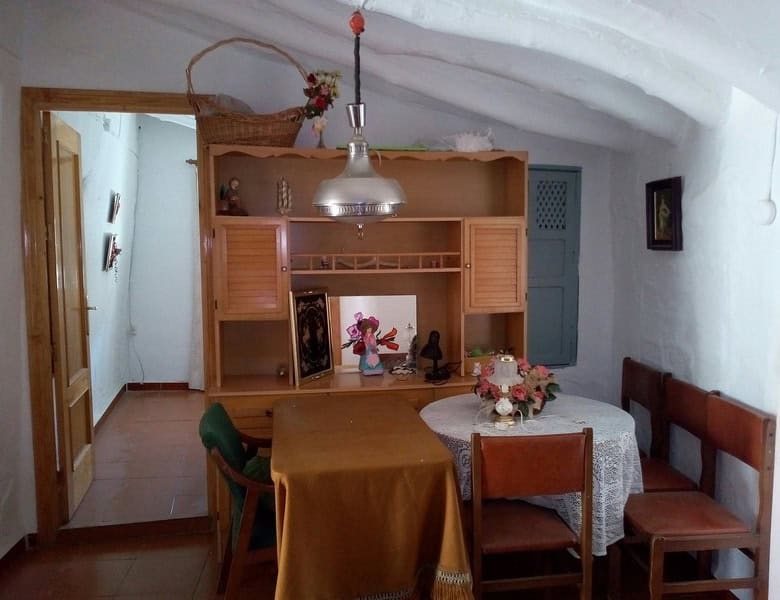 Charming interior of a village property in Armuna, Almeria, featuring traditional decor and cozy fur.