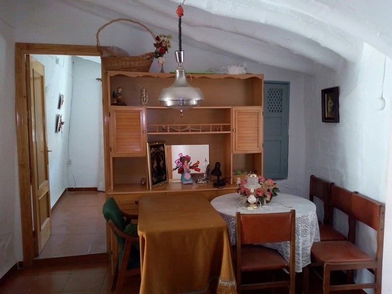 Charming interior of a village property in Armuna, Almeria, featuring traditional decor and cozy fur.