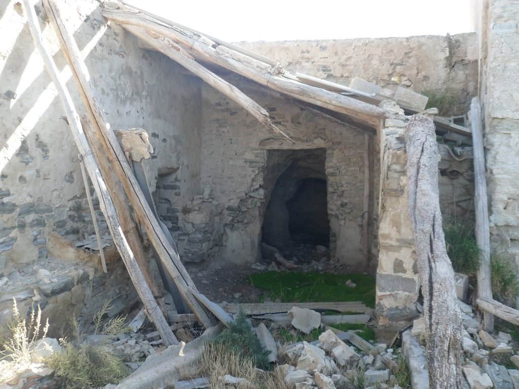 Old stone rural property in Venta del Peral, Granada, Spain.