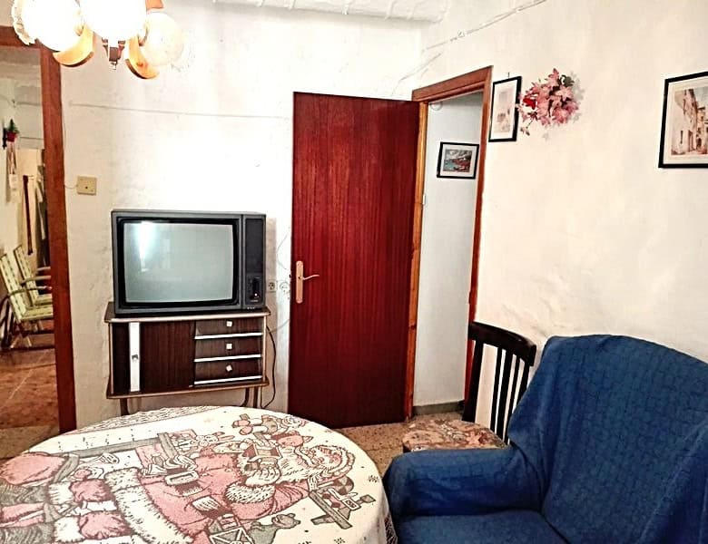 Village property interior with traditional furnishings in Somontin, Almeria, Spain.