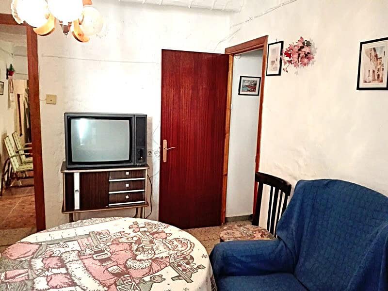 Village property interior with traditional furnishings in Somontin, Almeria, Spain.