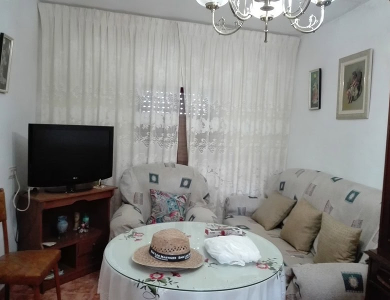 Charming village home in Seron, Almeria with cozy living room and traditional decor.