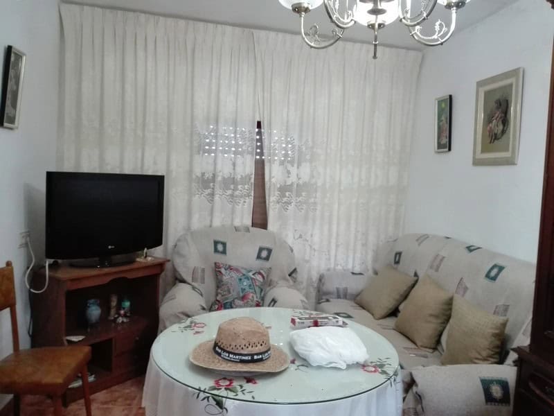 Charming village home in Seron, Almeria with cozy living room and traditional decor.