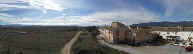 Village property for sale in Campo Camara, Granada, with scenic views and traditional architecture.