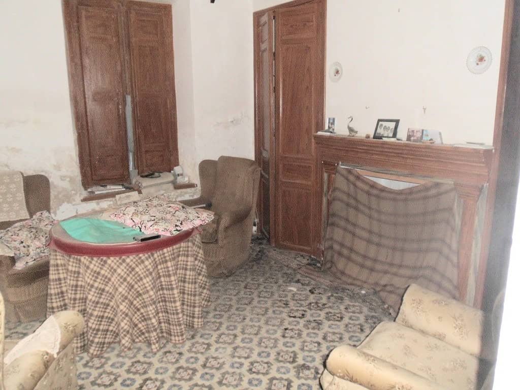 Village property in Campo Camara, Granada with cozy interiors and traditional decor.