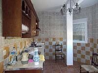 Beautiful farm property kitchen in Lucar, Almeria, featuring rustic design and traditional elements.