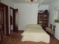 Interior view of a rustic farm property bedroom in Lucar, Almeria.