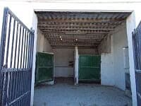 Stable with green doors in Lucar, Almeria, ideal for farm or equestrian use.