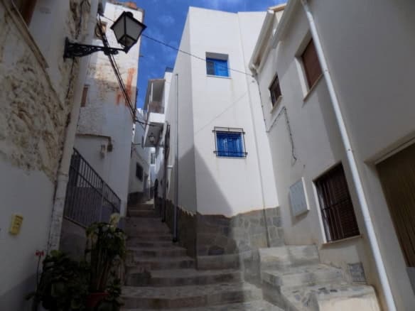 Village property in Sierro, Almeria with narrow streets and traditional whitewashed buildings.