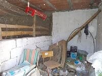 Interior of rural property in Sufli, Almeria with basic furnishings and storage items.