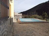 Charming rural property in Oria, Almeria featuring a private pool and scenic mountain views.