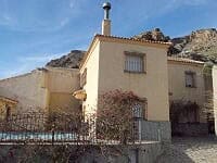 Charming rural house in Oria, Almeria with traditional architecture and scenic mountain views.