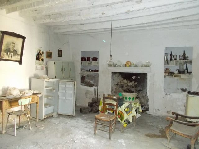 Charming village home interior in Tijola, Almeria with rustic furniture and traditional decor.