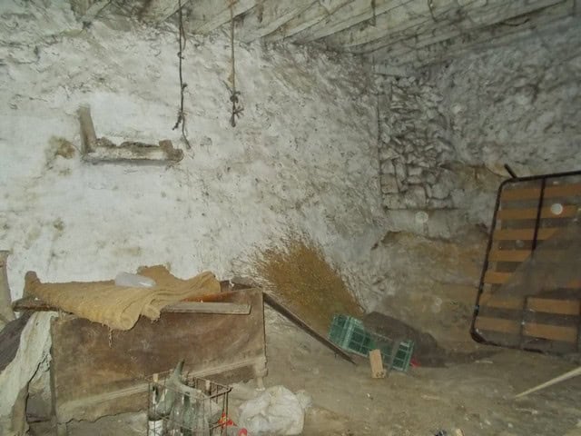 Charming village property in Tijola, Almeria, featuring rustic stone walls and traditional architect.