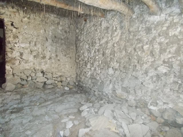 Village property ruin in Tijola, Almeria with stone walls and rustic features.