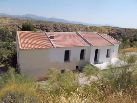 Rural property in Seron, Almeria with new construction and scenic mountain views.
