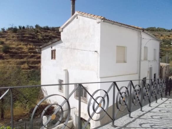 Charming white village house in Seron, Almeria, with traditional architecture and scenic mountain vi.