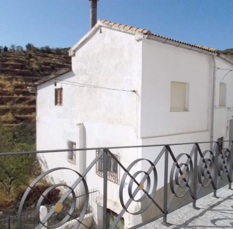 Charming white village house in Seron, Almeria, with traditional architecture and scenic mountain vi.