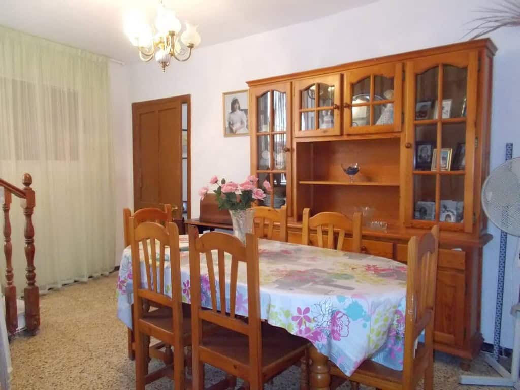 Charming dining room in a village property located in Seron, Almeria, featuring wooden furniture and.