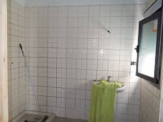 Charming village property in Seron, Almeria, featuring tiled walls and a small window for natural li.