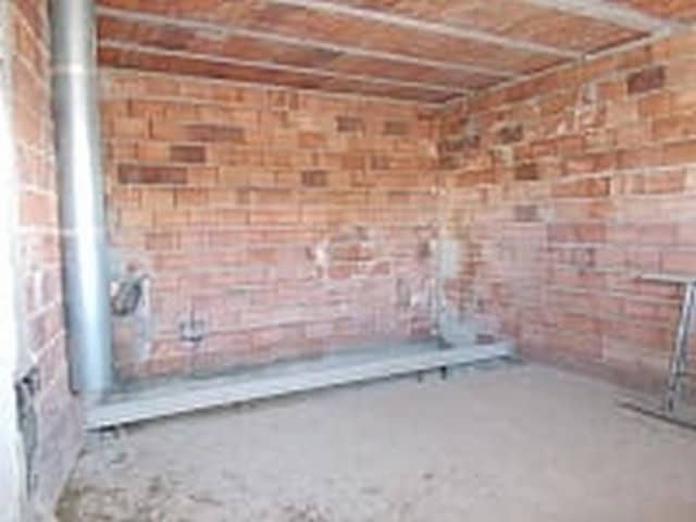 Village Property in Seron, Almeria with unfinished interior and brick walls.