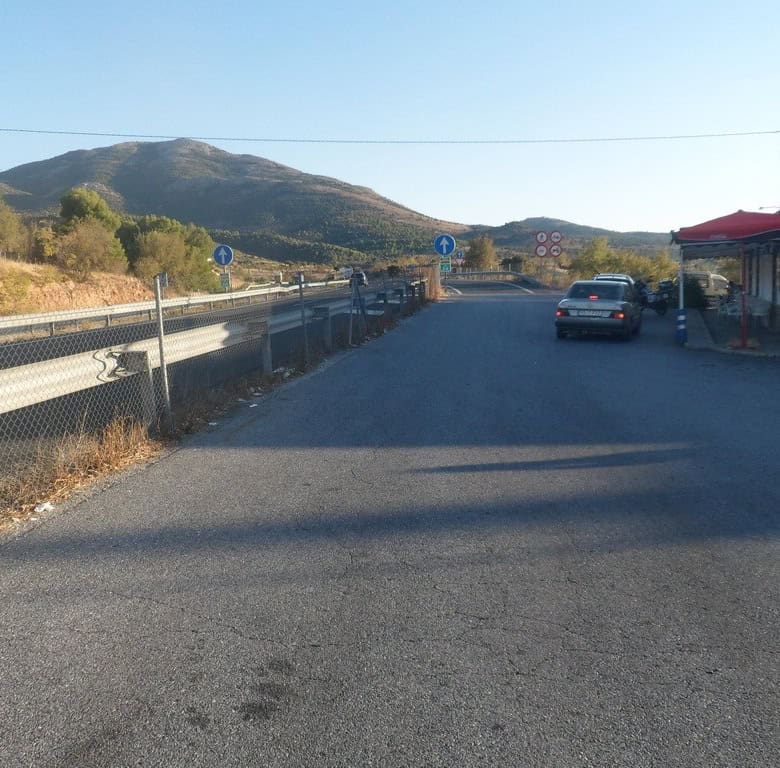 Commercial property in Baza, Granada, Spain with mountain views and roadside access.