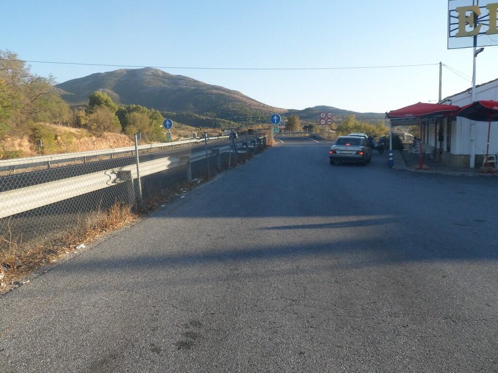Commercial property in Baza, Granada, Spain with mountain views and roadside access.