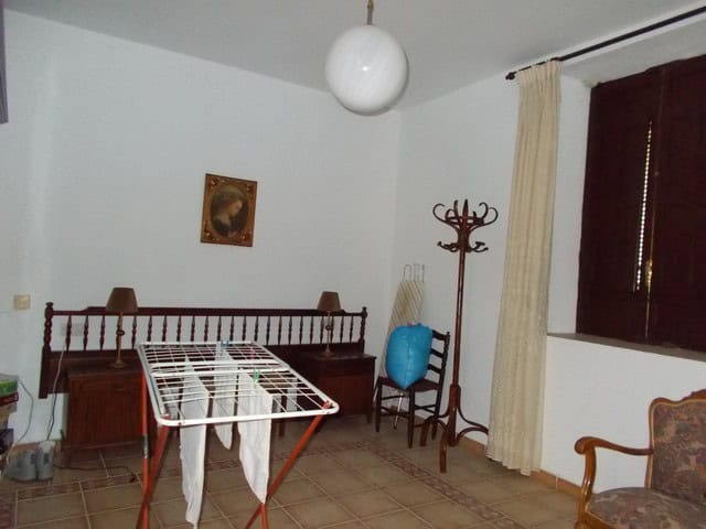 Charming village property in Tijola, Almeria, featuring a cozy interior with traditional furnishings.