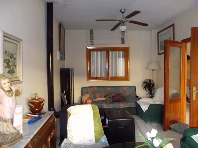 Charming village home in Cela, Almeria with cozy living space and traditional decor.