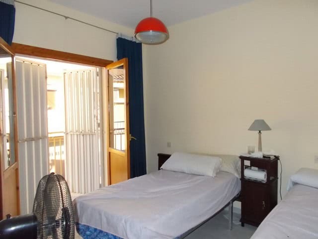 Charming village property in Cela, Almeria, with cozy bedrooms and traditional Spanish decor.