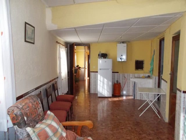 Charming village home in Zujar, Granada, featuring a cozy interior with simple furnishings and a fun.