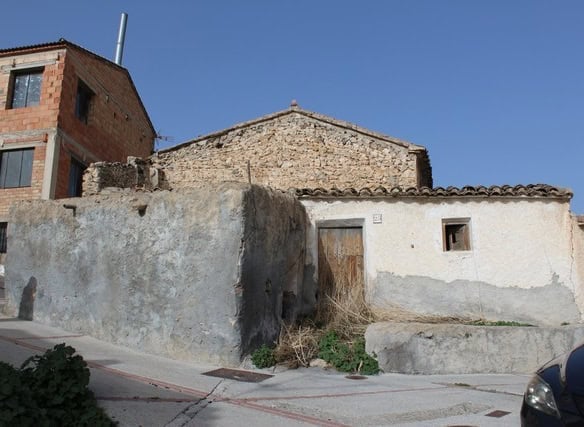 Charming village house in Lucar, Almeria, with rustic exterior and traditional architecture.