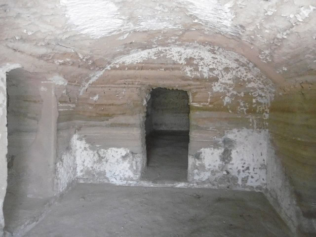 Cave house entrance in Benamaurel, Granada, showcasing traditional underground living spaces.