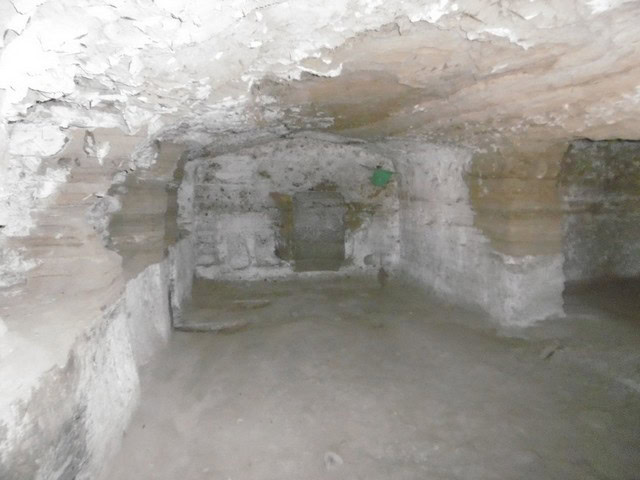 Cave house interior in Benamaurel, Granada, showcasing traditional underground living space.