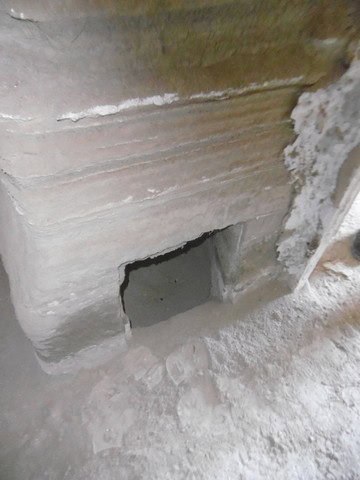 Cave house entrance in Benamaurel, Granada, showcasing traditional underground architecture.
