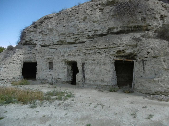Cave house carved into the rock in Benamaurel, Granada, offering unique living space in a scenic rur.