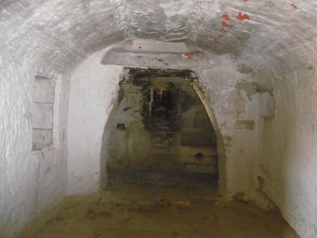 Cave house interior with arched ceiling in Benamaurel, Granada, showcasing traditional underground l.