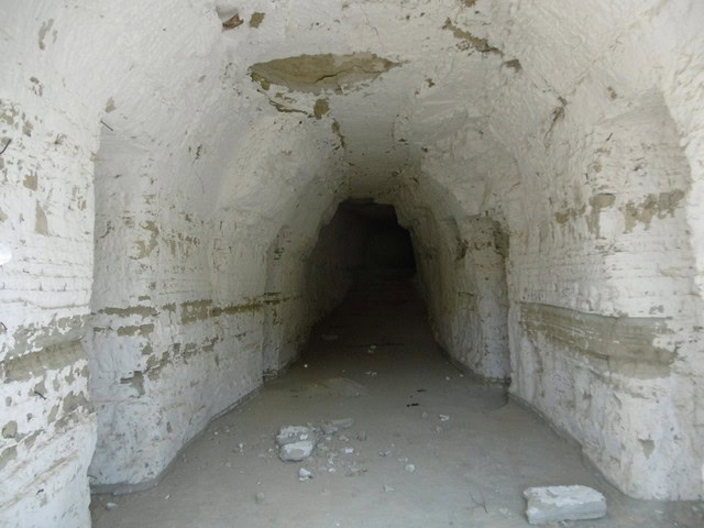 Cave house entrance in Benamaurel, Granada, showcasing traditional underground living spaces.