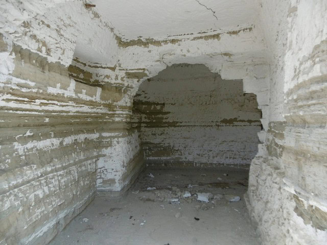 Cave house interior in Benamaurel, Granada, showcasing traditional underground living space.