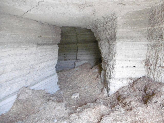 Cave house interior in Benamaurel, Granada, showcasing natural rock formations and unique living spa.