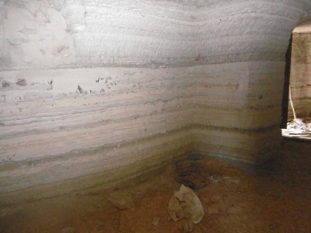 Cave house interior in Benamaurel, Granada, showcasing traditional underground living space.