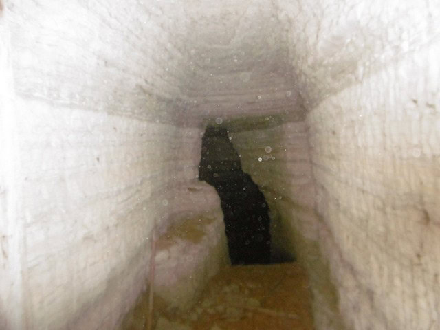 Cave house entrance in Benamaurel, Granada, showcasing unique underground living space.