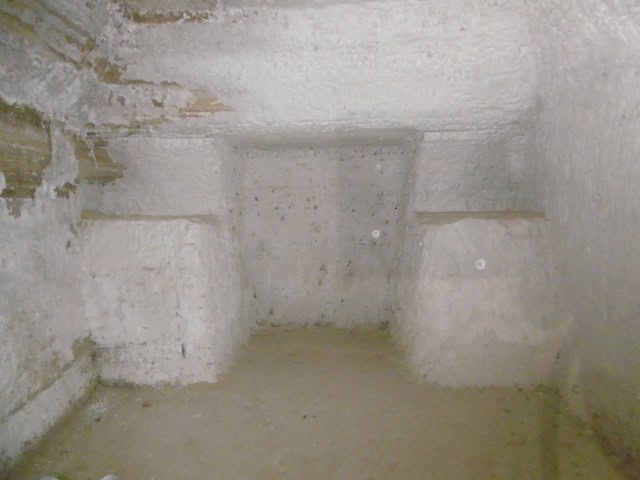 Cave house interior with rough concrete walls in Benamaurel, Granada, showcasing traditional undergr.