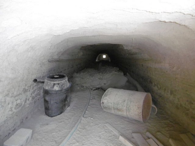 Unique cave house interior in Benamaurel, Granada, showcasing traditional underground living space.