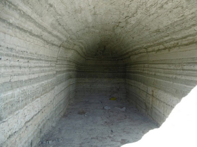 Cave house interior in Benamaurel, Granada, showcasing unique underground living space.