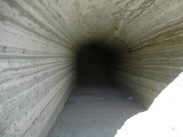 Cave house entrance in Benamaurel, Granada, showcasing traditional underground architecture.