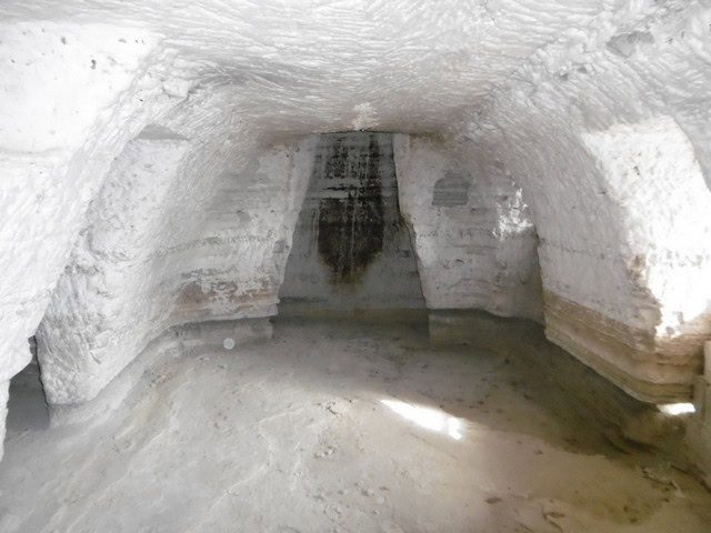 Cave house interior in Benamaurel, Granada, showcasing unique underground living space.
